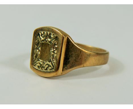 9ct Yellow Gold Signet ring with chased decorations to the centre panel. Finger size 'T-5'  3.8g