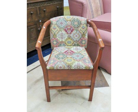 Oak Made Commode tub chair with needlepoint upholstery . Excellent condition. See photos. 