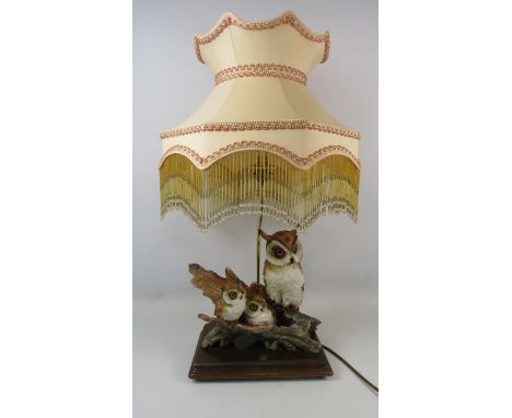 A Belcari Italian Owl figural table lamp with shade, 68cm from base to top of the shade.