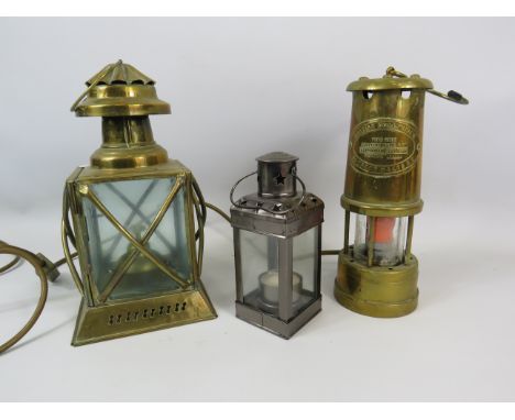 British Coal Mining Type Vale converted to electric lamp, a brass storm lantern and a tea light lantern.