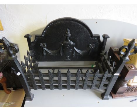 Cast Iron Fire Grate in as new and unused condition. Measures approx H:18 x W:21 xD:11 Inches. See photos.   S2