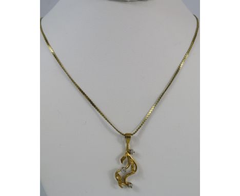 9ct gold 16 inch necklace and 9ct leaf pendant set with 3 small diamonds. 3.1 grams.