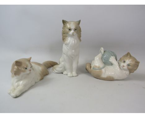 3 Nao Cat figurines.