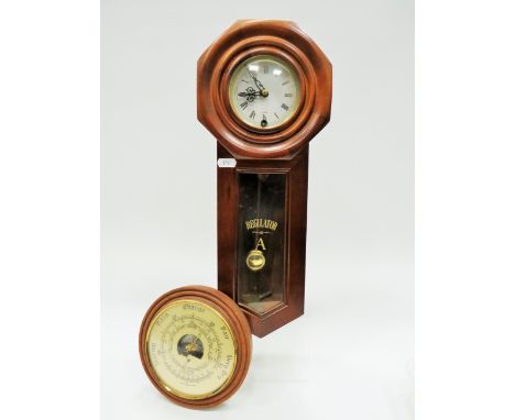 Minature mechanical 30 day Regulator which measures 18 inches long. Running order in excellent condition. Comes with a small 