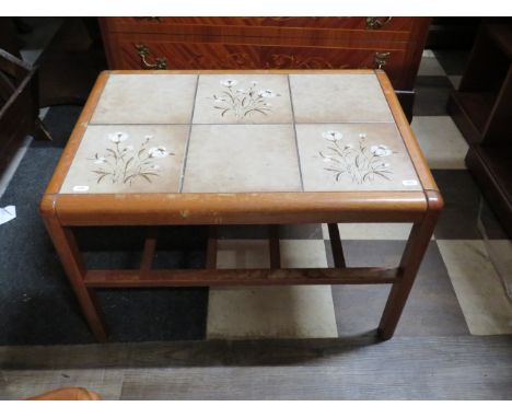 Small Six tile coffee table with magazine rack under. Measures approx H:17 x W:26 x D:18 Inches. See photos.   S2