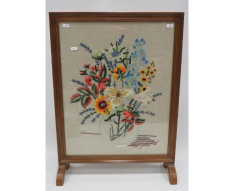 Pretty Oak Framed firescreen containing a needlepoint picture of flowers under a glass frame.   Measures approx 27 x 20 Inche