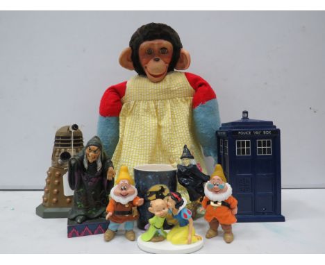 Mixed lot including a vintage Chimp doll, Dr Who Dalek &amp; Phone box and Snow White figurines etc.