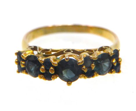 14ct Yellow Gold ring set with Three large Circular Sapphires plus four smaller sapphires to the ends.  Finger size 'N'   2.3