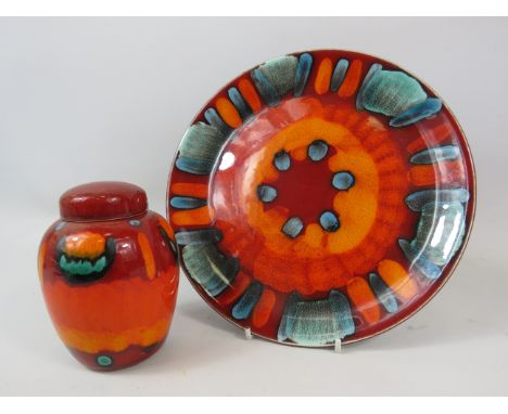 Poole pottery Volcano pattern 21cm plaque and small ginger jar.