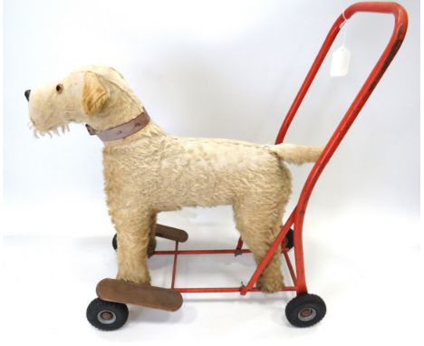 Vintage Childs walker as a Fox Terrier Dog raised on solid Rubber Wheels,  Made by Lines Brothers of Ireland. (pre 1951 Tri-a