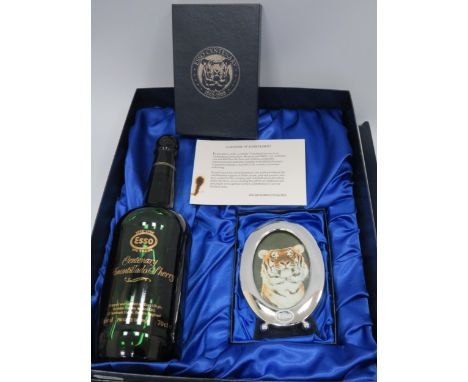 Unopened bottle of Esso centenary 100 years Amontillado cherry in a presentation box with a picture frame.