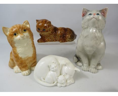 4 Ceramic cat figurines by Babbacombe, Coalport, Goebel etc, the tallest measures 20cm.