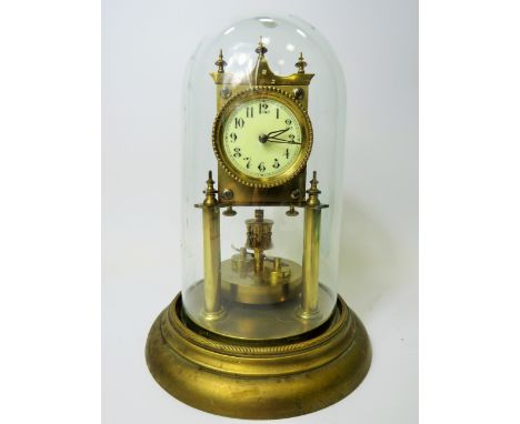 Brass made Anniversary clock with enamel face. No makers mark .  Appears to be in running order. Glass dome.  No key present.