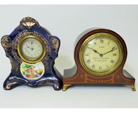 8 Day Wooden mantle clock with Local Interest face, Intermittent runner together with a french ornate ceramic cased clock, no
