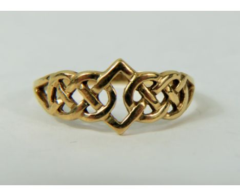 9ct Yellow Gold Pierced band in a Celtic Design.  Finger size 'S'  2.0g