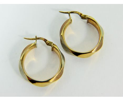 Pair of Yellow and White Gold twist hoop earrings with integral fasteners.  20mm wide.   Total weight  3.0g