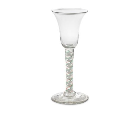 A red and green colour twist wine glass, circa 1765The bell bowl on a stem containing a multi-ply corkscrew edged on one side