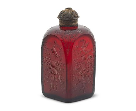 A scarce engraved South German silver-gilt mounted Rubinglas bottle, circa 1700In deep ruby-red glass, of square section with
