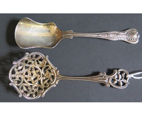 A Victorian Cast Silver Sugar Casting Spoon with pierced foliate decoration, London 1894, William Hutton &amp; Sons Ltd. 13cm