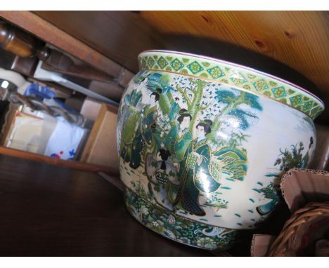 A Carved Barley Twist Gate Leg Table and a modern Chinese fish bowl 