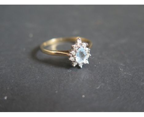 A 9ct Gold, Aquamarine and Diamond Ring, size R, 2g 