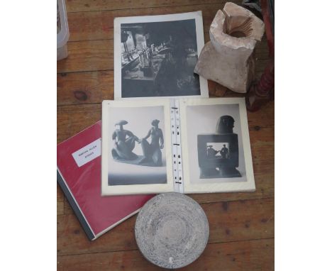 A Black and White Photograph of Martha Allen in her studio, two bound folders illustrating her works in sculpture and dishes,