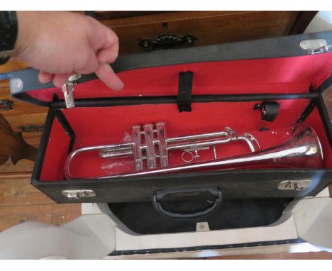 A Raisons trumpet in hard case 