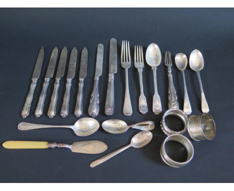 A Selection of Victorian and later Silver including flatware, napkin rings, ivory handle silver butter knife, silver handle t