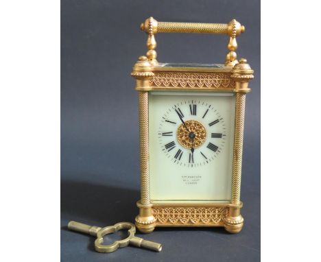 A Small Gilt Brass Carriage Clock, the dial signed H.W. BEDFORD 67 REGENT ST. LONDON, with key, 12.5cm, running 