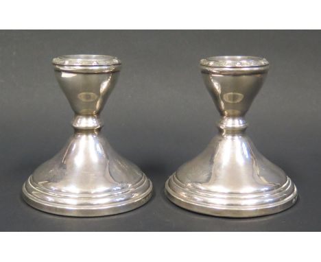 A Pair of Modern Loaded Silver Candlesticks with Celtic style decoration, Birmingham 1962, Adie Bros., 10cm high 