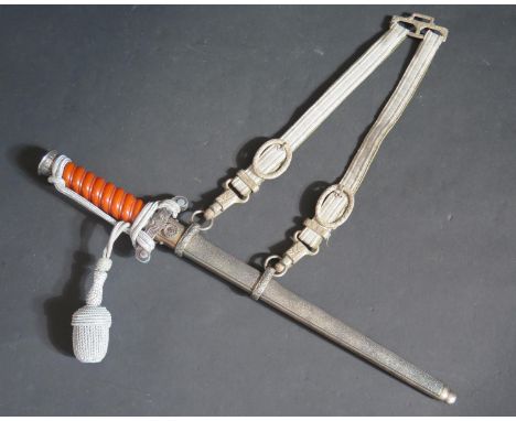 A WWII German Army Dagger with scabbard and hanging straps, blade marked TIGER