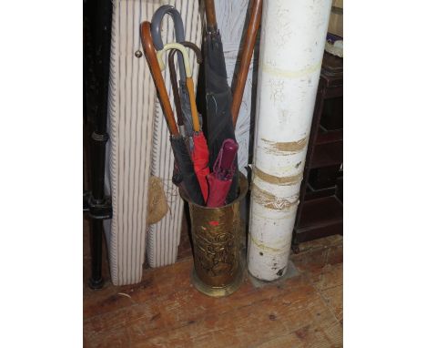 A Brass Stick Stand and Contents 