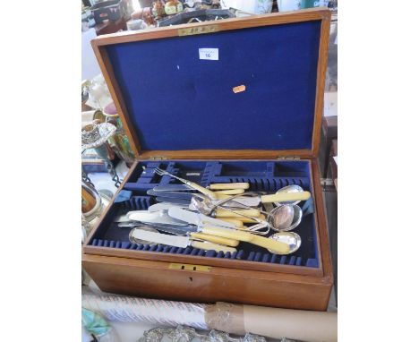 An Oak Canteen with odd electroplated silver flatware 