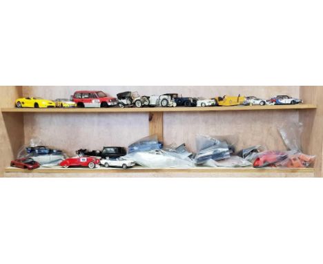 2 SHELVES OF MODEL CARS IN VARIOUS STATES OF DAMAGE &amp; PLASTIC ASSEMBLY KITS