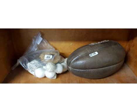 20TH CENTURY RUGBY BALL, 12 GOLD BALLS &amp; AN EDWARDIAN LAWN TENNIS TAPE MEASURE