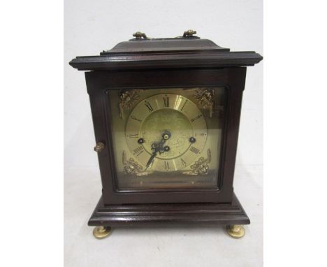 A brass faced mantle clock&nbsp;
