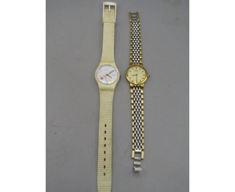 A gold plated Rotary ladies wrist watch and a retro Swatch watch