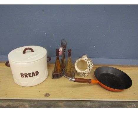 Ceramic bread bin, flavoured oils, salt cellar and cast iron pan&nbsp;