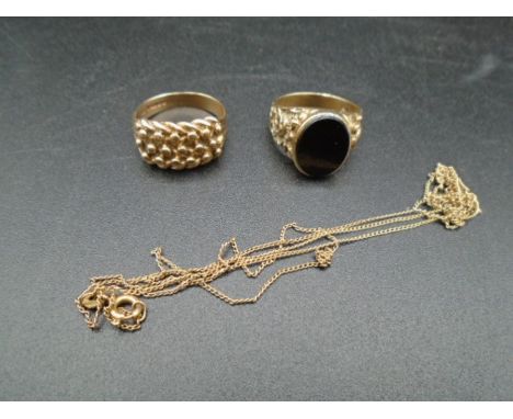 A 9ct gold hallmarked ring, 7.03g, a signet ring with black stone stamped '9ct' inside, plus a chain stamped 10k -(broken) 2.