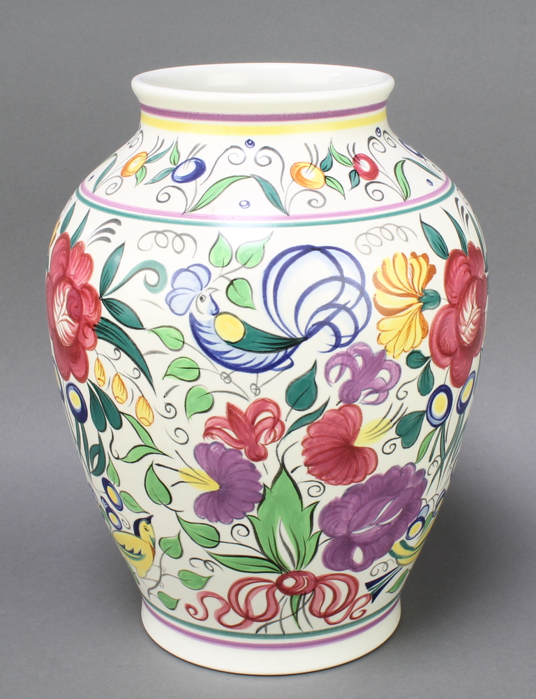 A large Poole Pottery oviform vase decorated with exotic birds amongst ...