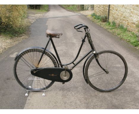 *A Rudge-Whitworth Lady's 'Special' Loop-Frame Bicycle. Dating pre-WWI, a black enamel 25-inch braced frame featuring a corre