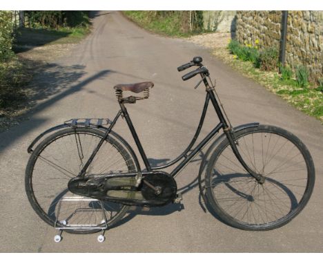 *A Singer & Co Lady's Loop-Frame Bicycle, with a 23-inch frame indistinctly numbered 40627,  and featuring a cottered bottom 