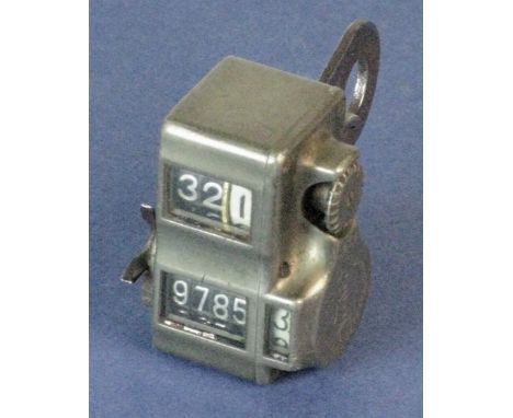 *Veeder Cyclometer. A rare odometer with a five-digit mile recorder window and a three-digit trip recorder,  nickel-plated an