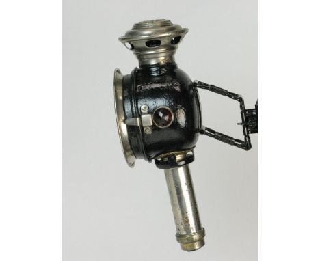 *A Max Pressler & Co., 'Pressler' candle-powered lamp,  retaining its sprung parallel mounting bracket, threaded candle retai