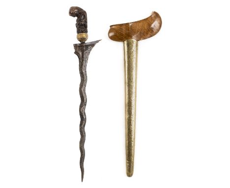 *Kris. Indonesian Kris,  the 35.5cm wavy blade with gilt metal cup and finely carved mythical beast hilt, 45cm long overall, 