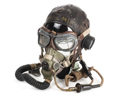 *Helmet and Mask. WWII C Type brown leather flying helmet and oxygen mask,  chamois leather lining compete with earphones wit