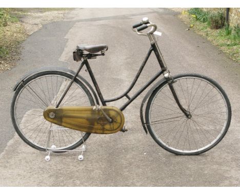 *A Rudge-Whitworth Lady's Loop-Frame Bicycle. Dating pre-WWI, a black enamel 21-inch braced frame with signs of original box 