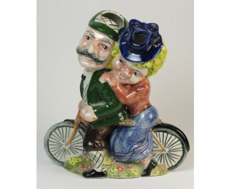 *Shorter & Sons 'Daisy Bell'. A multi-coloured underglaze flower vase portraying two riders on a tandem bicycle.  The largest