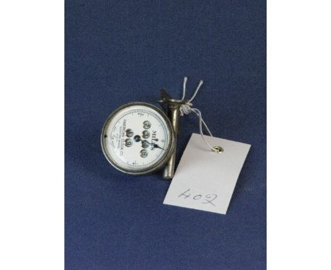 *American Clock Co., odometer with a four-digit mile recorder window and a two-digit trip recorder,  nickel-plated with an en