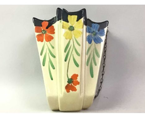 ARTHUR WOOD WALL POCKET, decorated with flowers, along with an Art Deco jug and a small flower vasejug 19.5cm highQty: 3